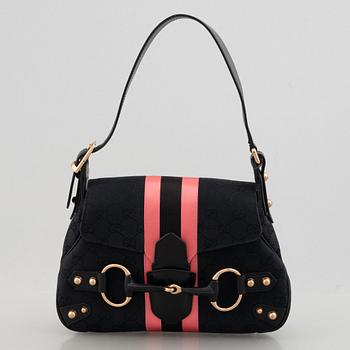 Gucci, väska och plånbok.