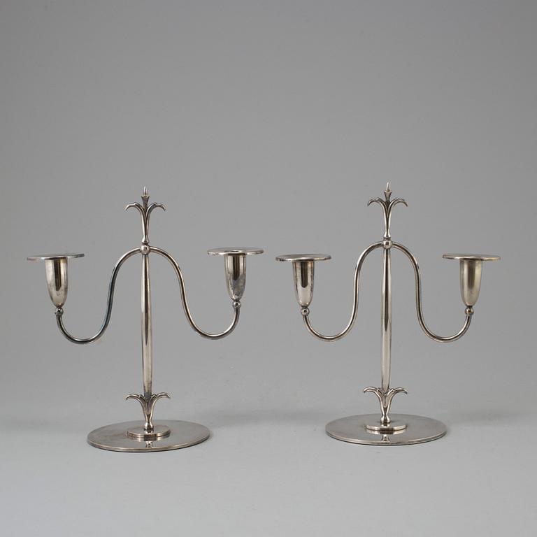 a pair of Elis Bergh silver plated candelabras, Swedish grace, CG Hallberg, Stockholm, 1920s.