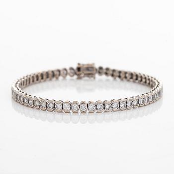 Tennisrannekoru, 18K valkokultaa, briljanttihiottuja timantteja.