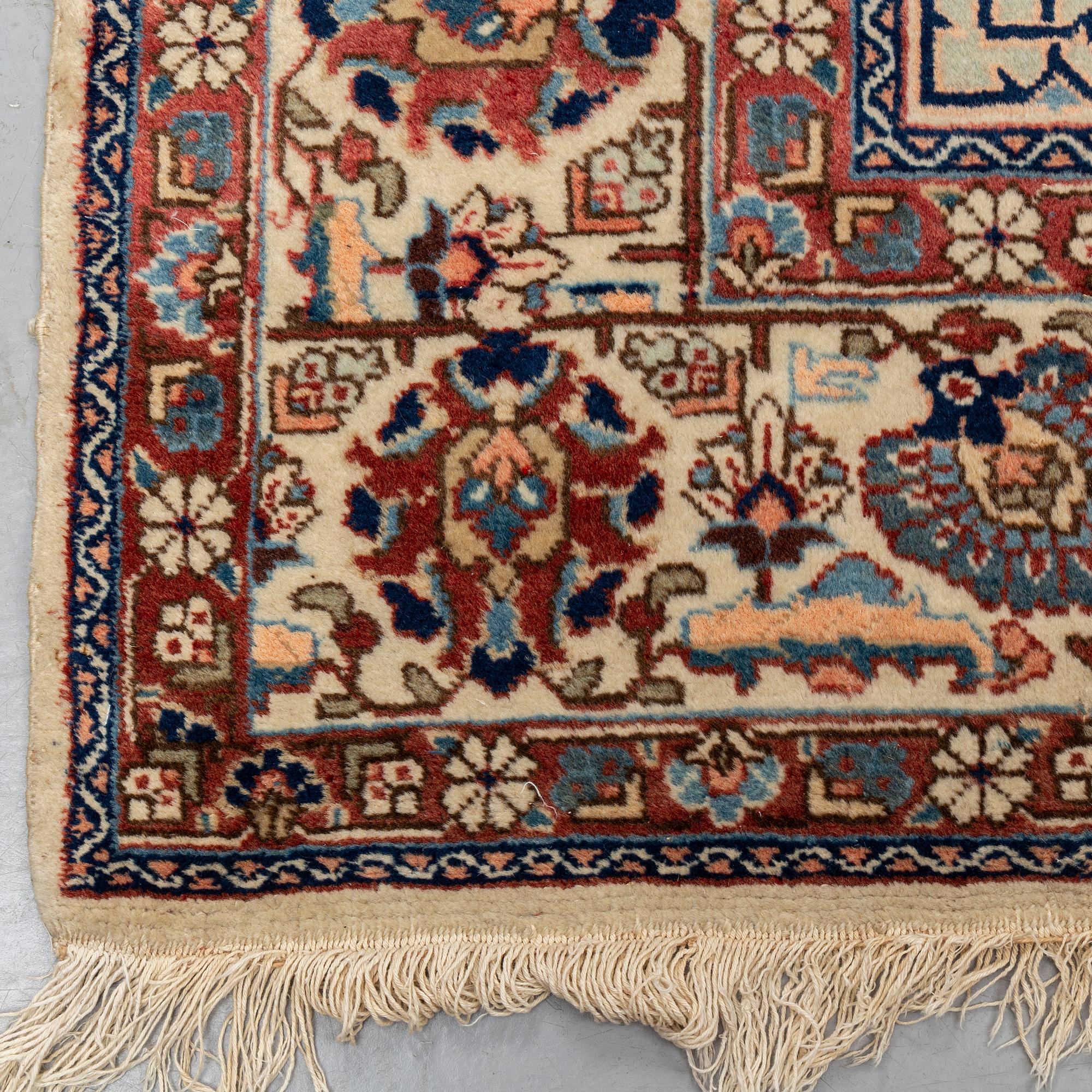 A carpet, semi-antique Tabriz,  342 x 231 cm.