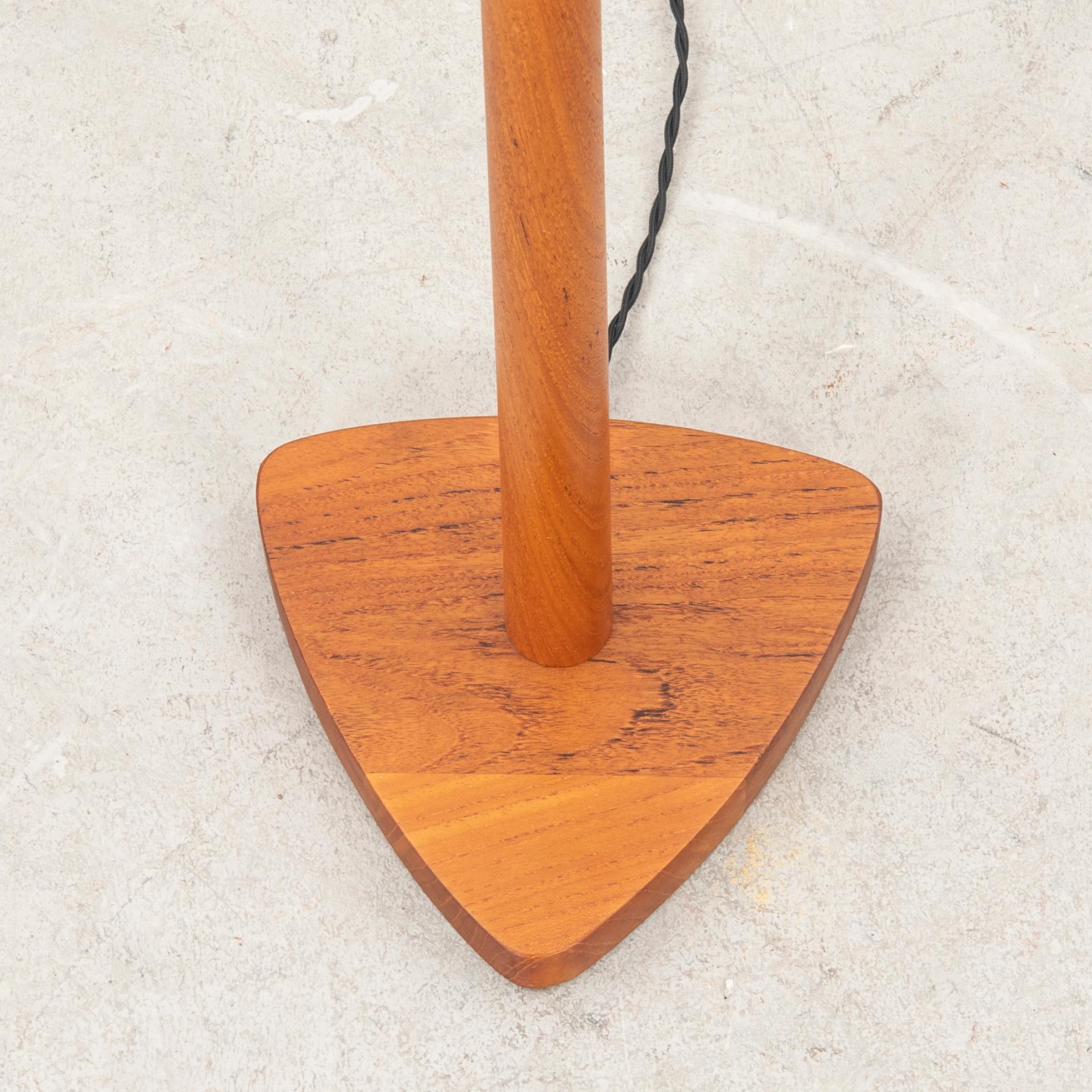 A 1940/50s teak floor lamp.