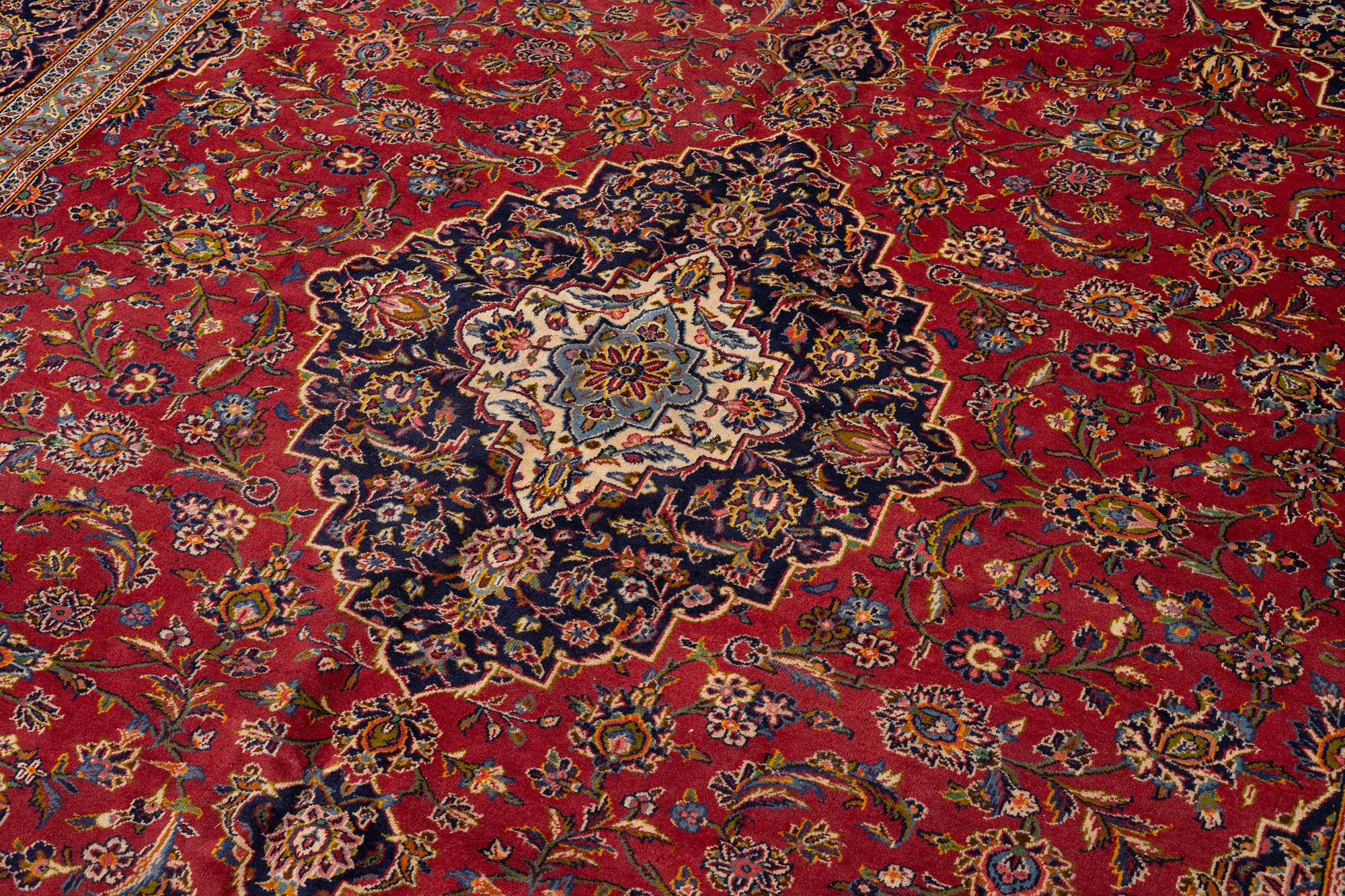 A Keshan carpet, central Iran, signed c, 392 x 301 cm.