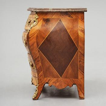 A rococo parquetry and gilt brass-mounted commode attrbuted to M. Engström (master in Stockholm 1758-97).