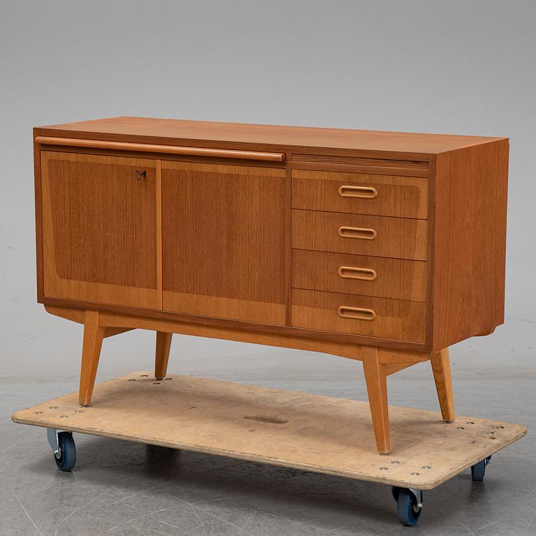 A 1950's teak sideboard.