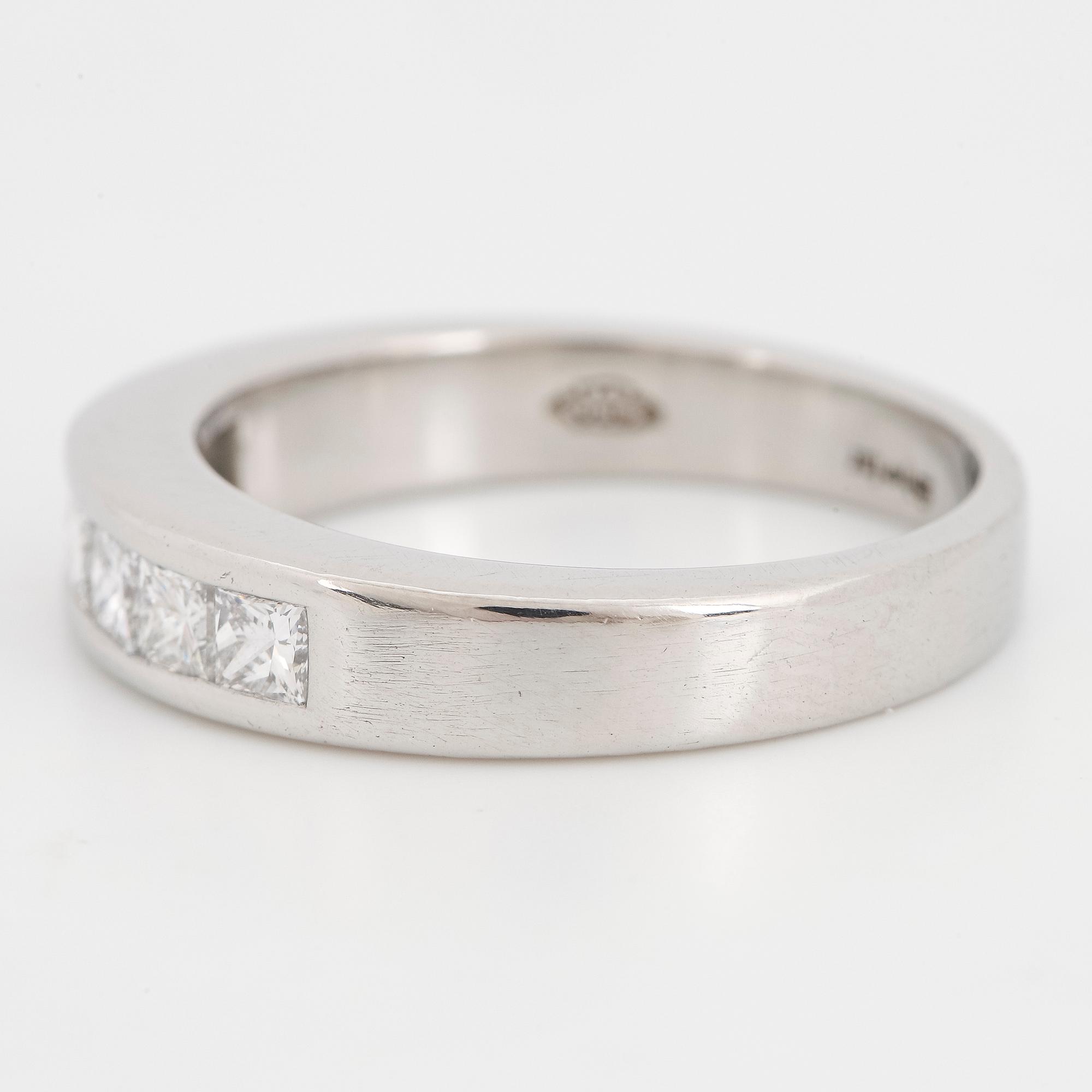 Platinum and six princess-cut diamond ring.