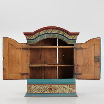 A Swedish provincial wall cabinet, possibly from Dalarna, early 19th century.
