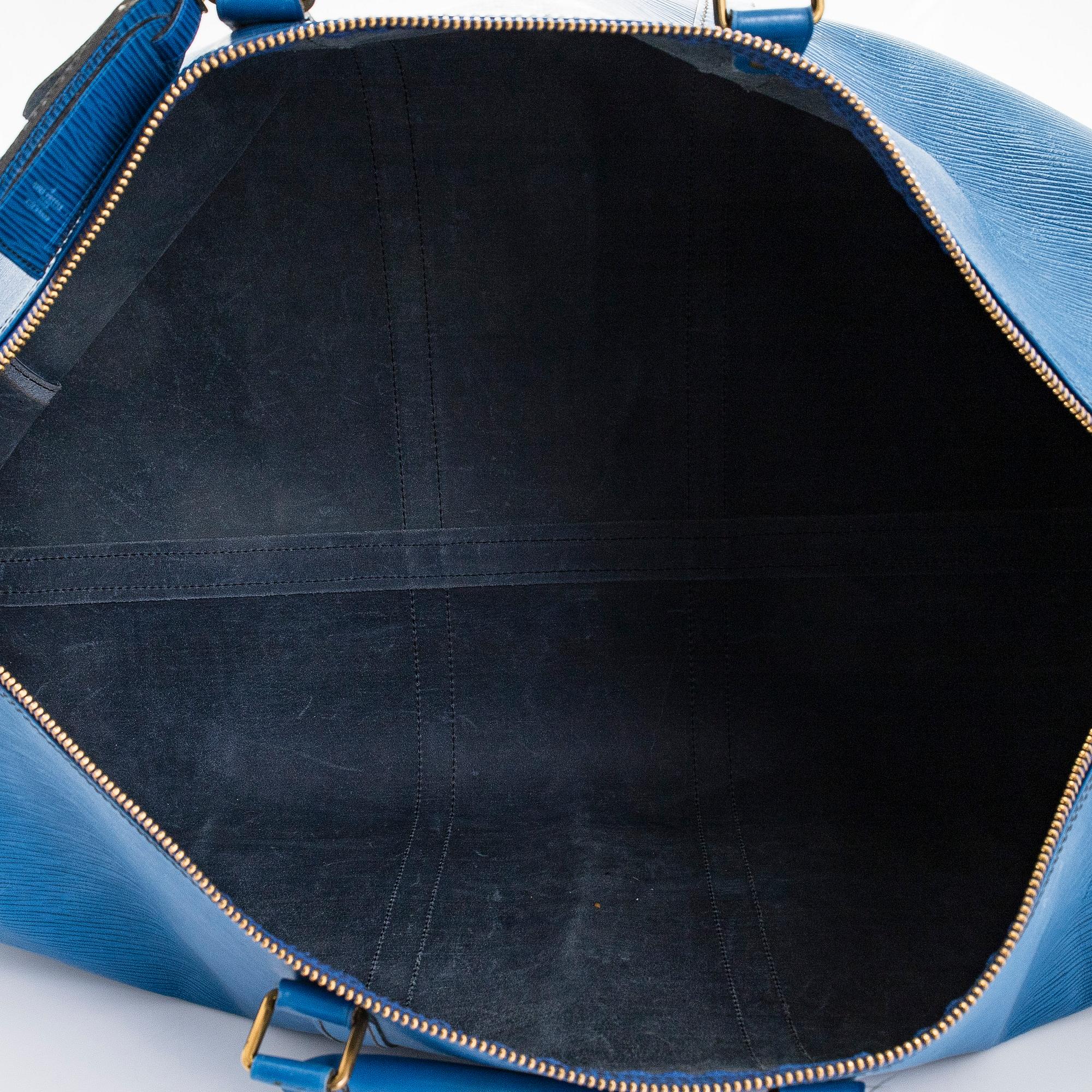 Louis Vuitton, an 'Epi Keepall 60' weekend bag.