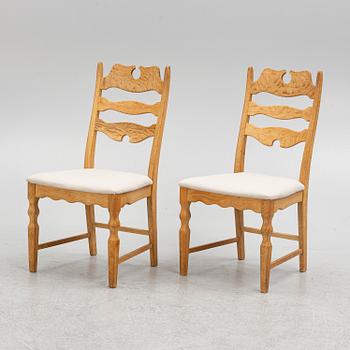 Henning Kjærnulf, attributed to. A set of eight chairs, Denmark, second half of the 20th Century.