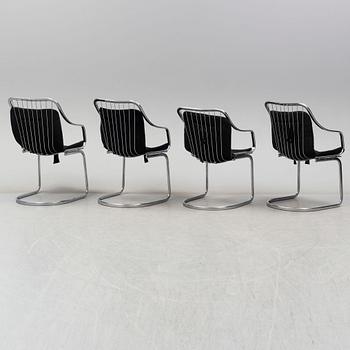 An Italian set of a glass table with four chromed metal chairs, 1970s.