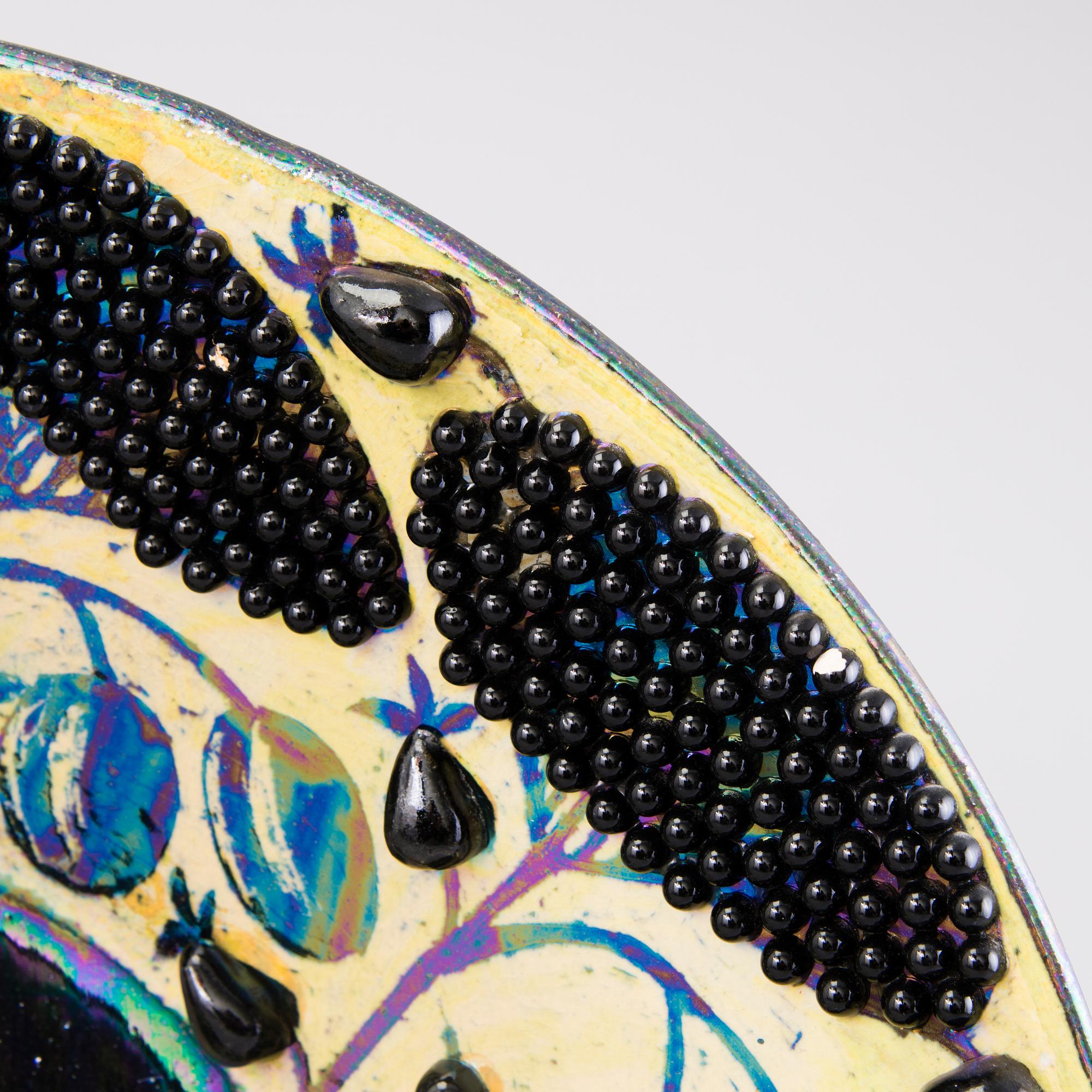BIRGER KAIPIAINEN, a decorative dish signed Kaipiainen Arabia.