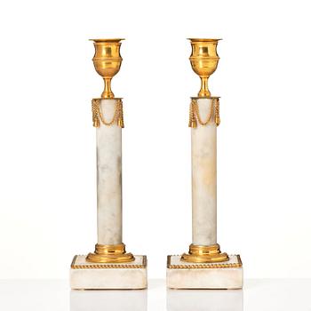 A pair of late Gustavian candlesticks.