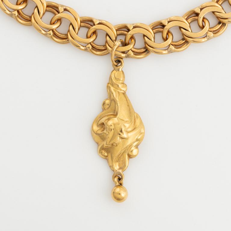 Gold Charm Bracelet, 18K gold.