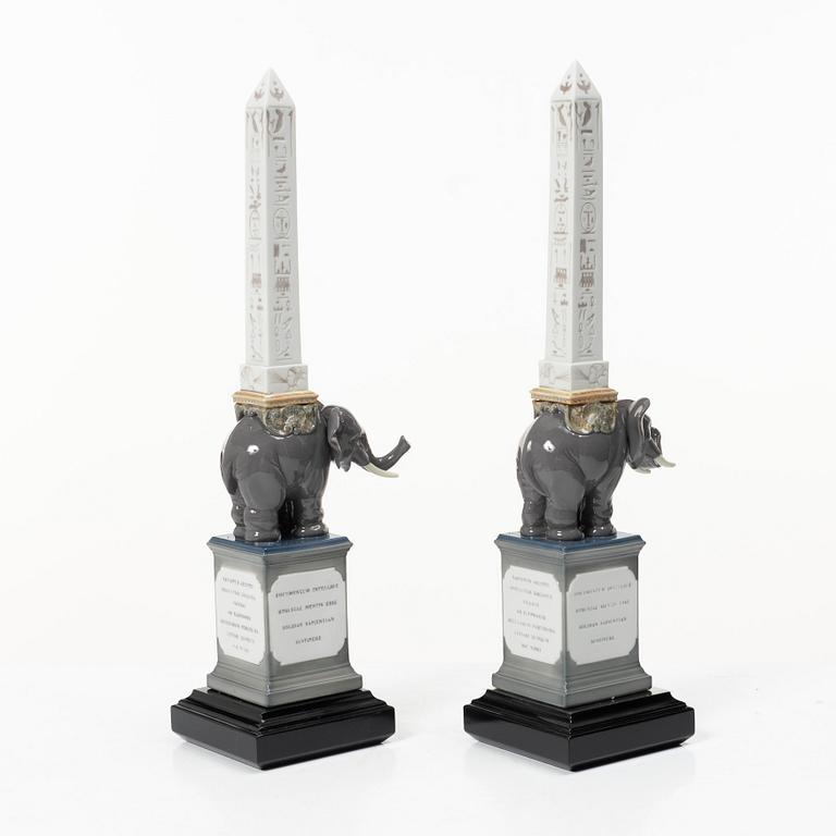 Lladró, figurines, a pair, "Pulcini obelisk enamels left" and "Pulcini obelisk enamels right", Spain.