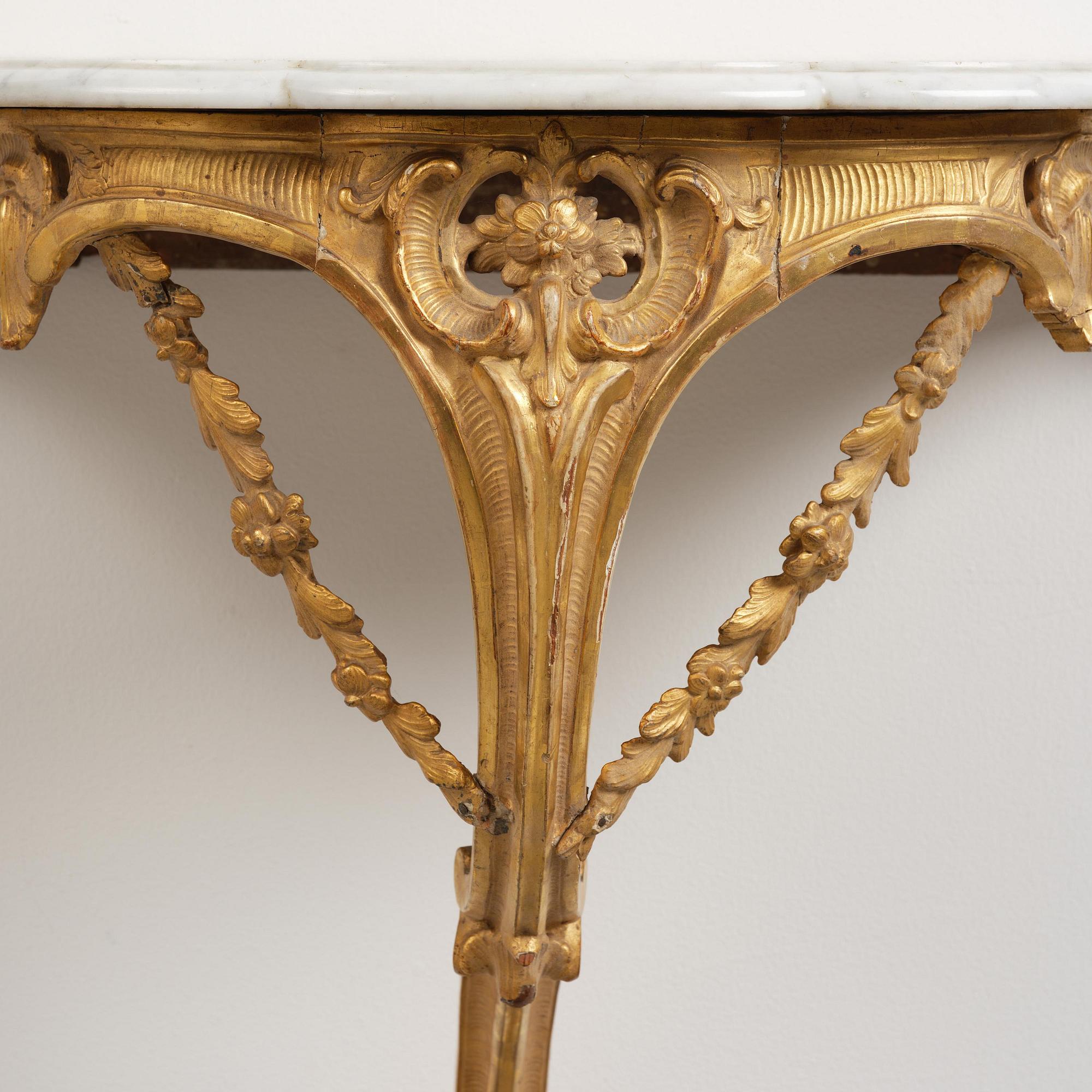 A rococo giltwood and marble console table, Stockholm, later part 18th century.