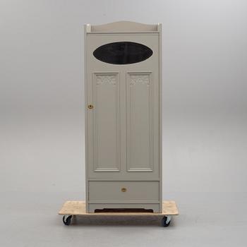 an early 20th century wardrobe.