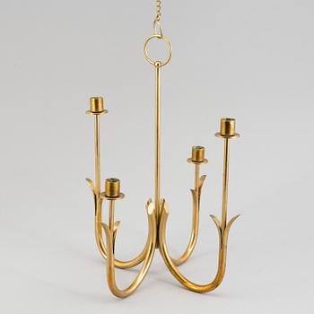 A brass candelabrum by Gunnar Ander for Ystad Metall.