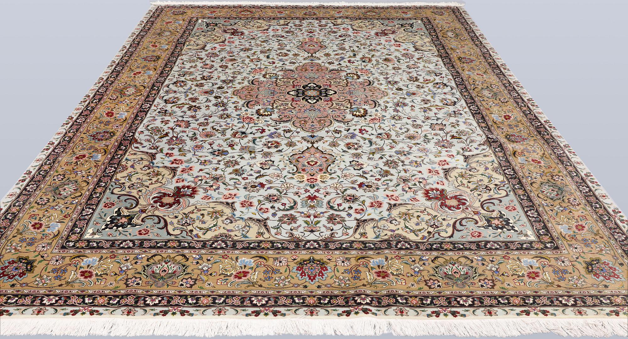 A Tabriz carpet, part silk, so-called 50 Raj, approx. 348 x 252 cm.