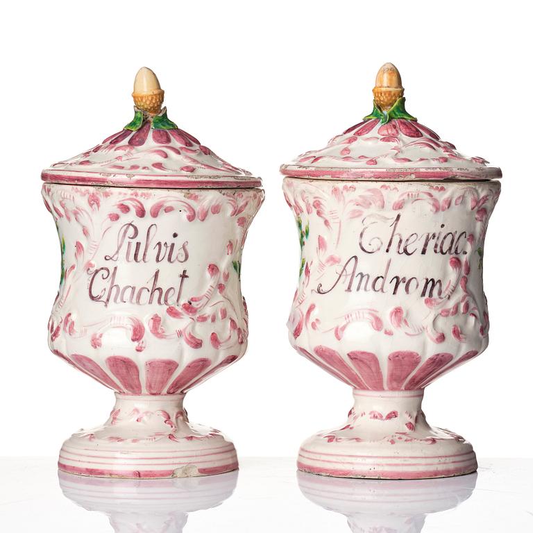 A pair of faiance historismus pharmacy jars with covers, 19th century.