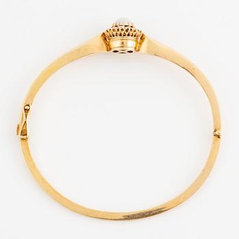 Bracelet in 18K gold with a half-pearl and rose-cut diamonds.