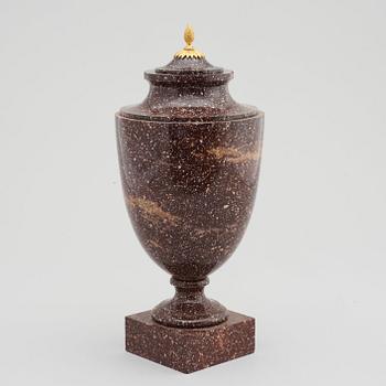 A late Gustavian 19th Century porphyry and gilt bronze urn.