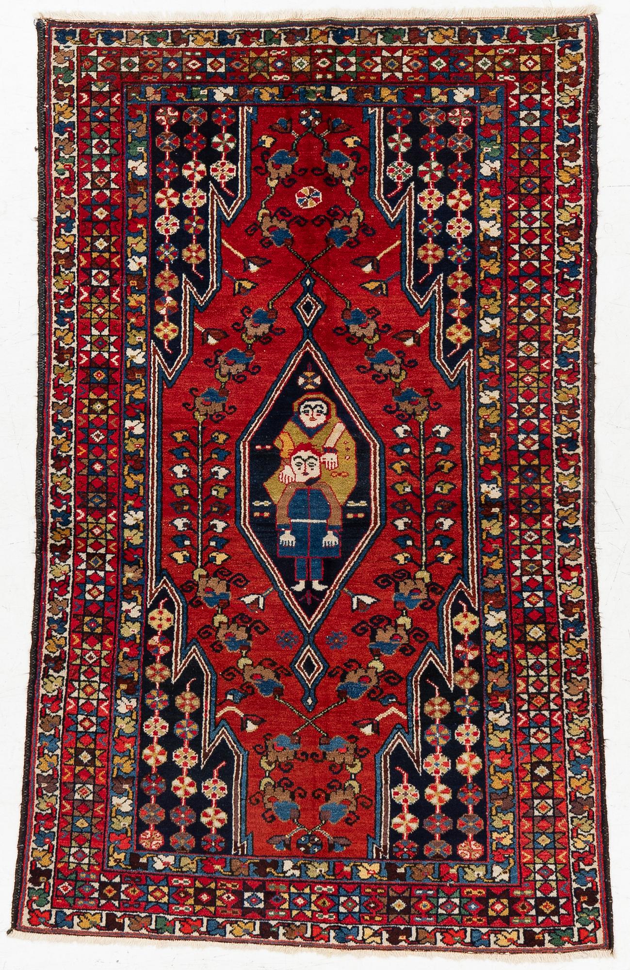 A semi-antique pictoral Mazlagan rug, Northwest Iran, c. 195 x 125 cm.