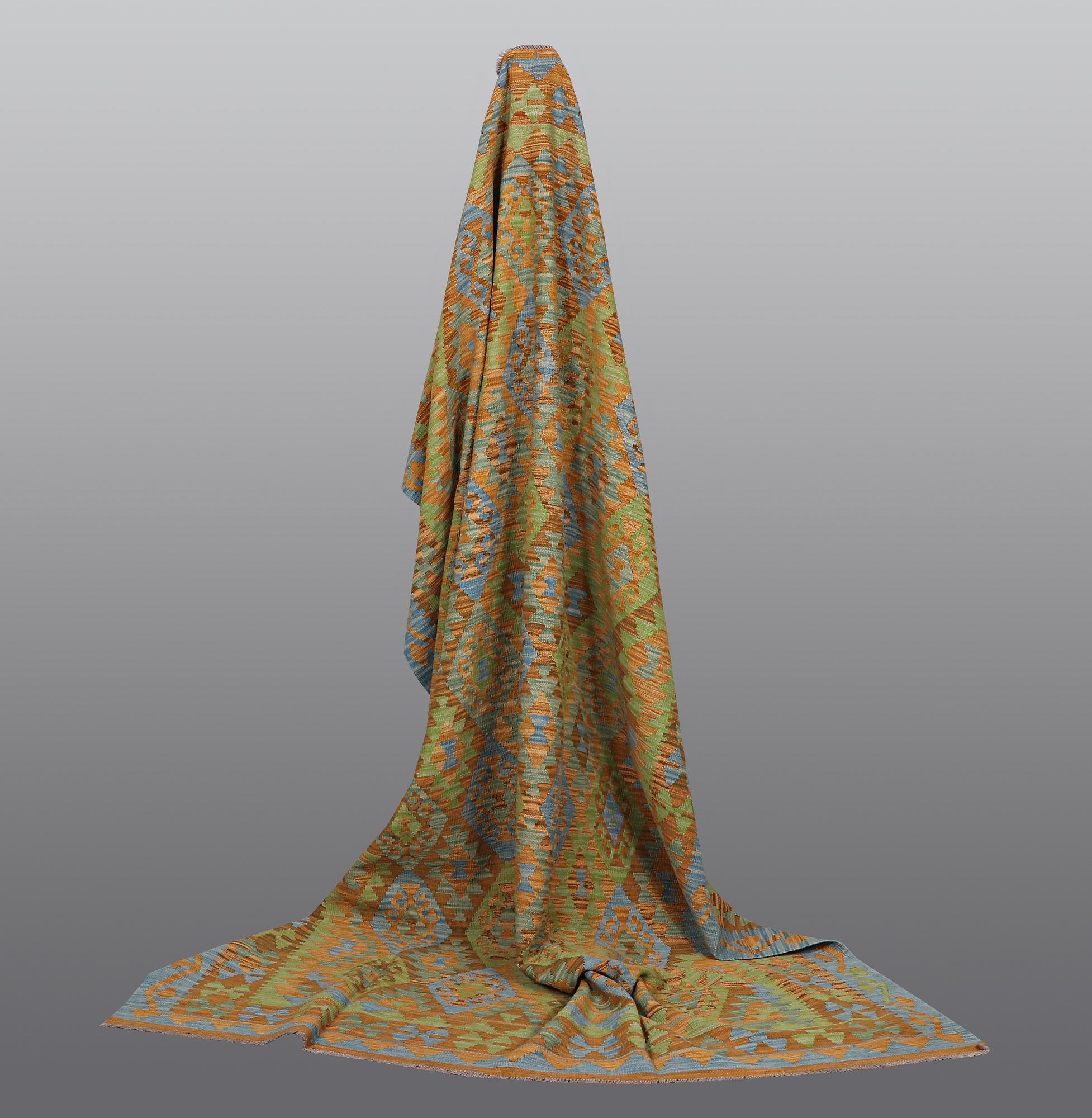 A carpet, kilim, ca 291 x 205 cm.