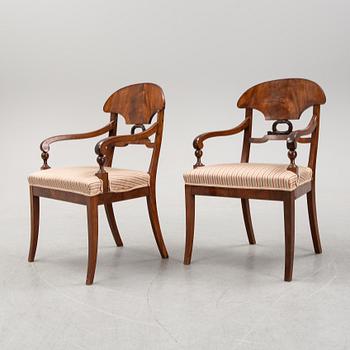 A pair of mahogany armchairs, mid 19th Century.