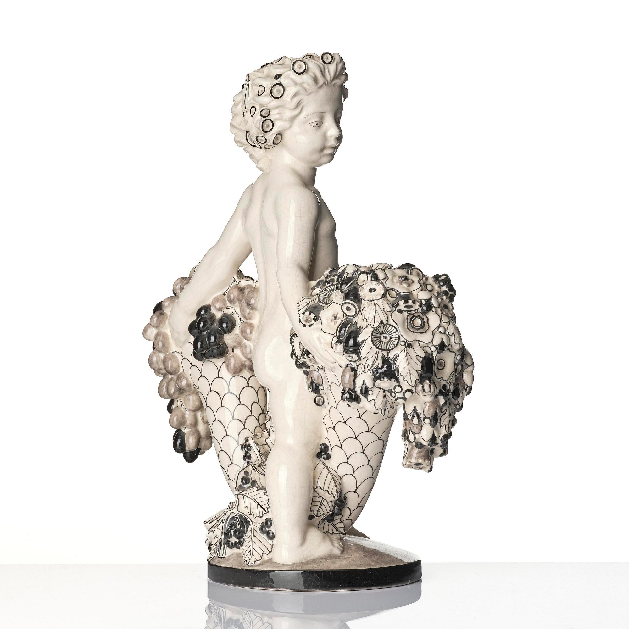 Bertold Löffler, a ceramic sculpture of a putto with cornucopia, model 156, Wiener Keramik, Vienna, Austria, 1908- 1912.