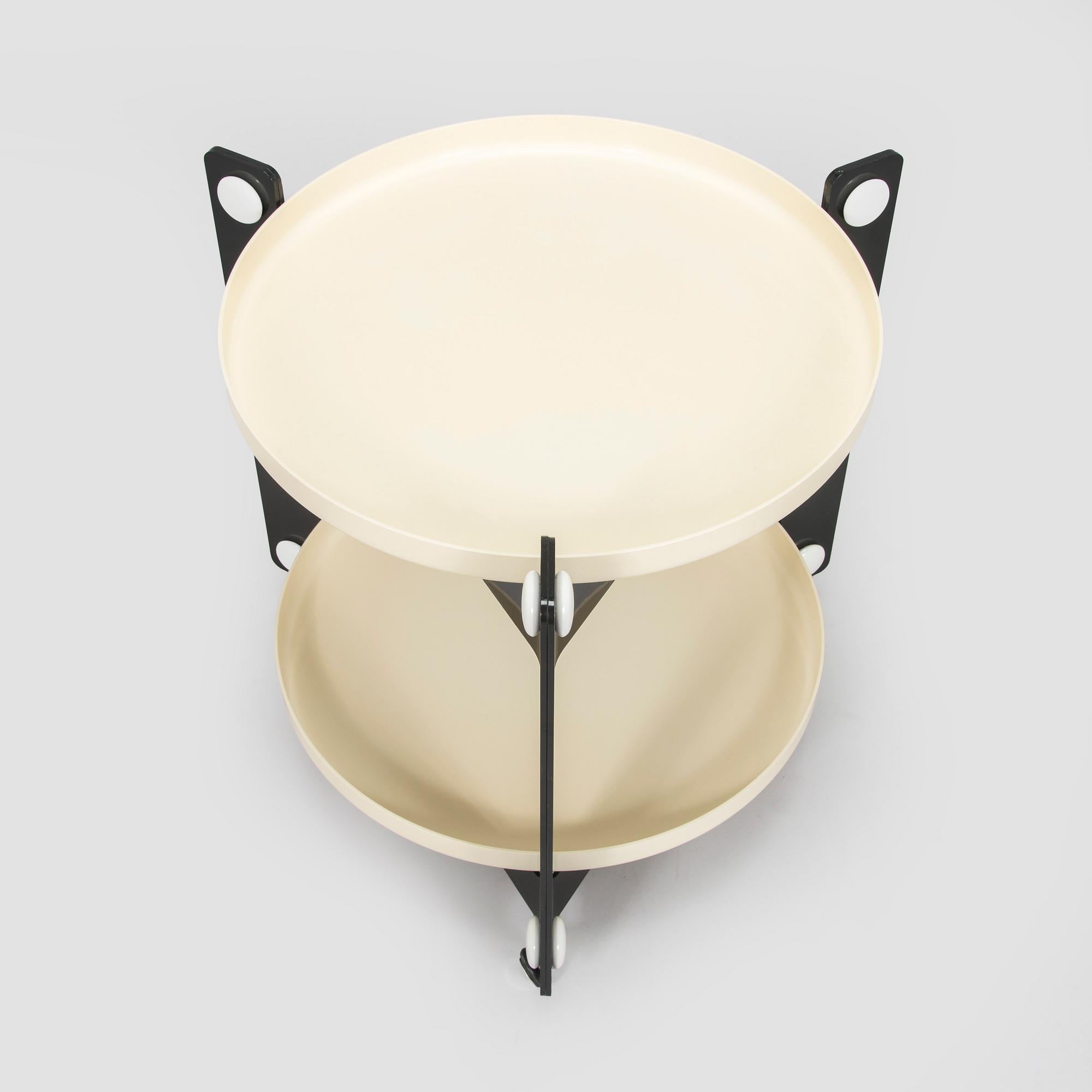 Luigi Massoni, a 1970s table / tray table, for Guzzini, Italy.