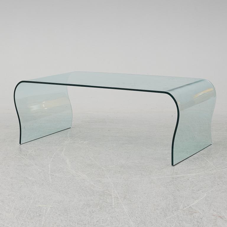 A mid 20th Century glass coffee table.