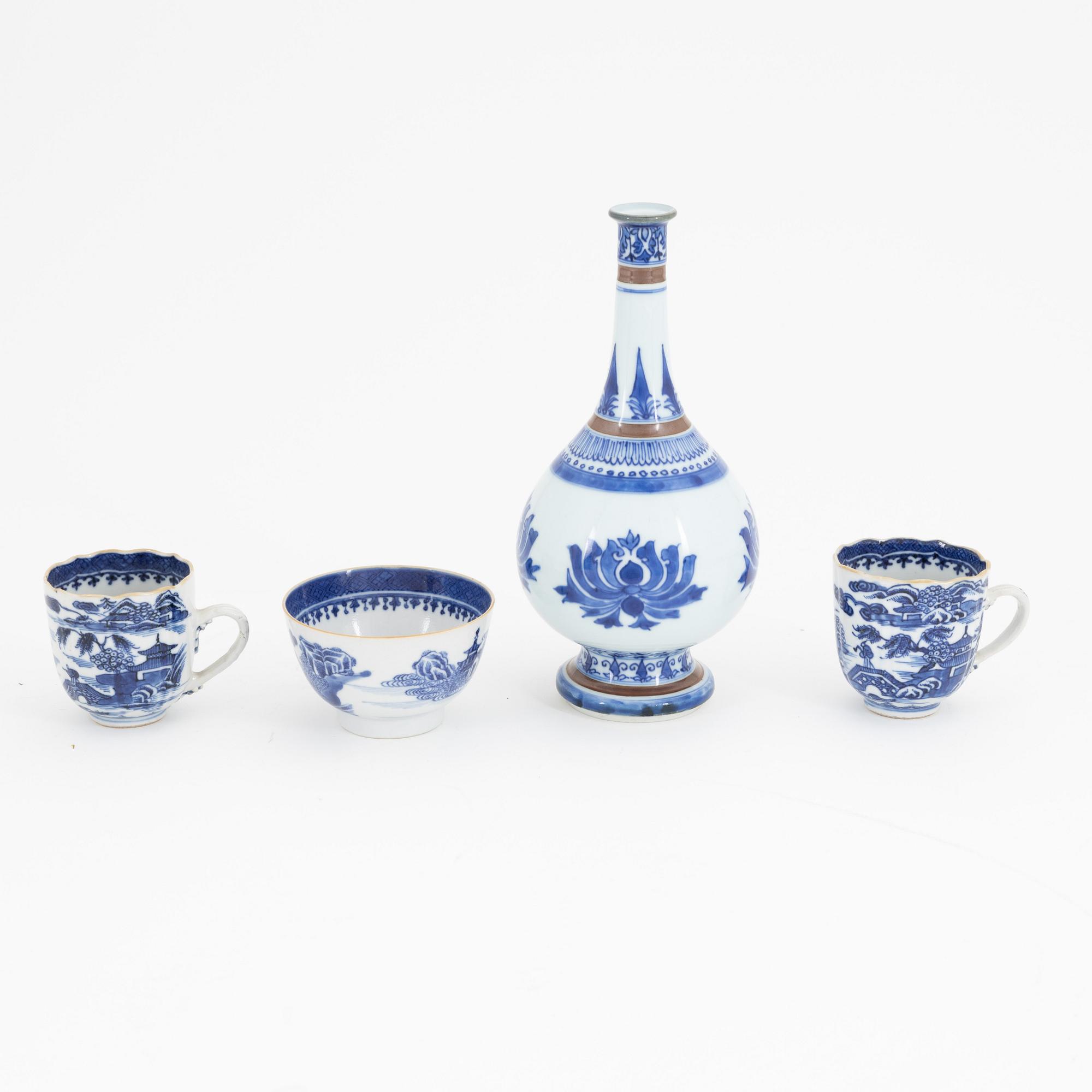 A group of Chinese blue and white porcelain: dish, vase, three cups and two plates. 18th and 20th century.