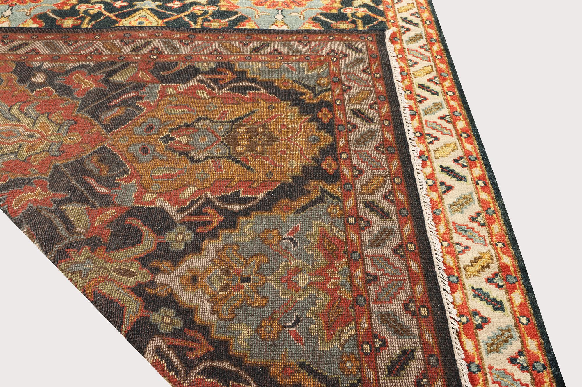 An oriental carpet with Mamluk design, a. 331 x 274 cm.