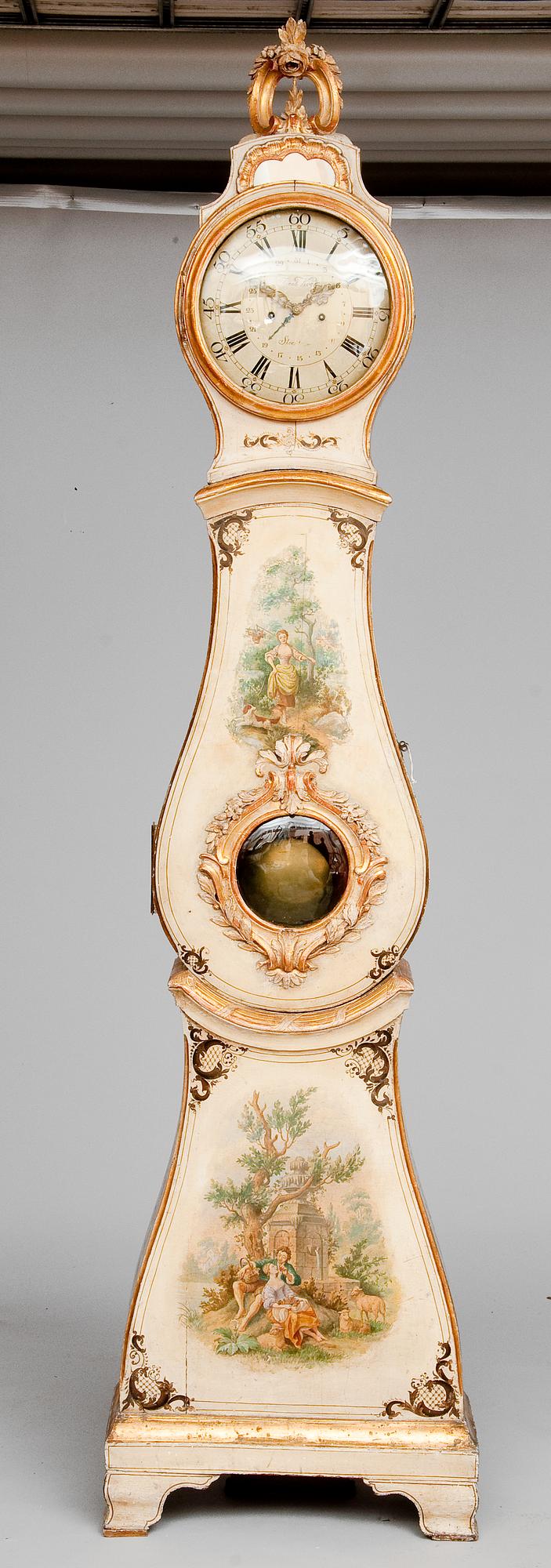 A GRANDFATHER CLOCK.