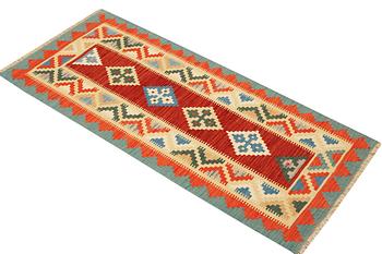 A Kilim runner carpet, c. 196 x 88 cm.