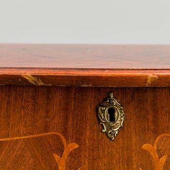 A chest of drawers, mid-20th Century.