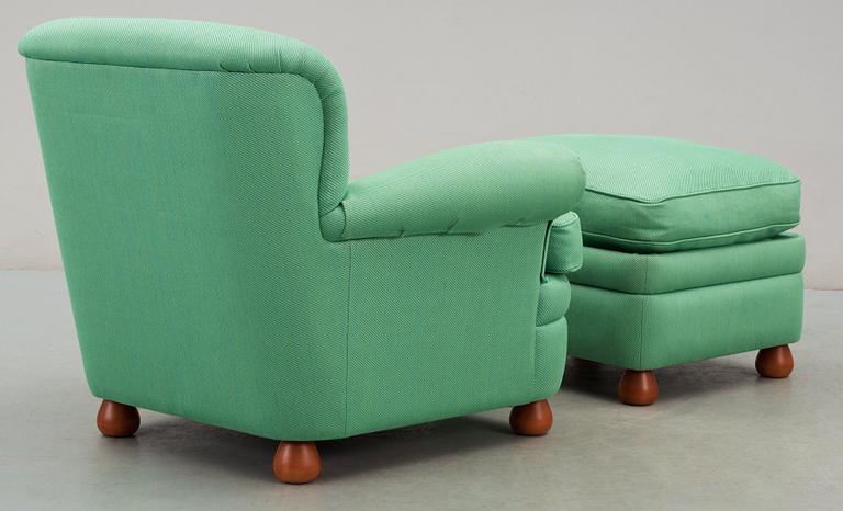 A Josef Frank armchair and ottoman, Svenskt Tenn.