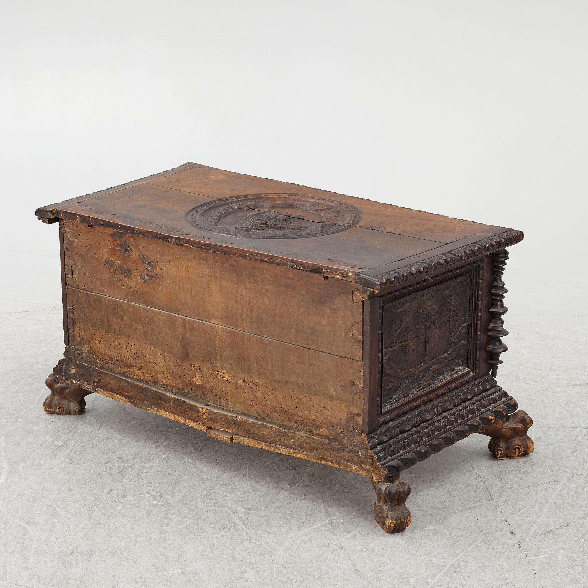 A baroque style wooden chest, 19th century.
