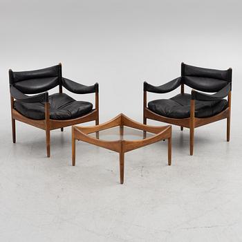 Kristian Solmer Vedel, a pair of "Modus" armchairs and a low table, Søren Willadsen, 1960's.