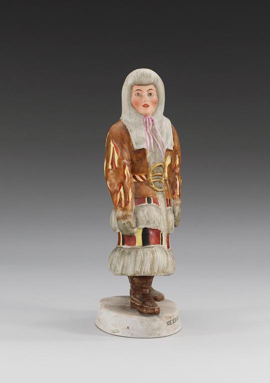 A Russian bisquit figure of a Samoyed woman from Mezen, Central Porcelain Trust, Dimitrovski, Verbilki, Moscow, 20th Century.