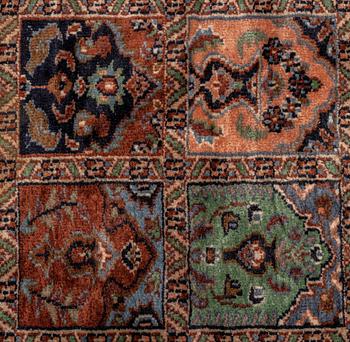 A carpet, an old Pakistani, ca 276,5-279 x 191,5-196,5 cm (as well as 2-2,5 cm flat weave at the ends).