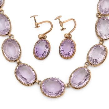 A gilded silver necklace and a pair of earrings set with faceted amethysts.