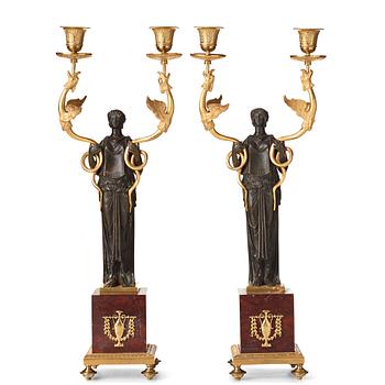 7. A pair of French Empire two-light candelabra, beginning of the 19th century.