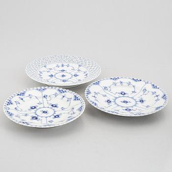 An 84-piece porcelain "blue fluted" dinner and coffee service, full and half lace, Royal Copenhagen, Denmark.