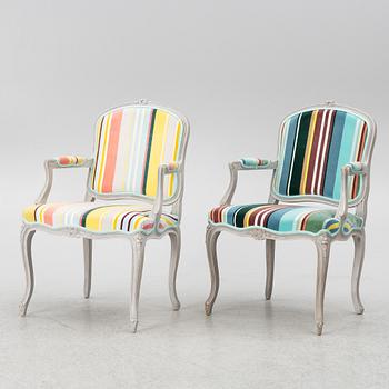 A pair of Rococo style armchairs, 20th century.