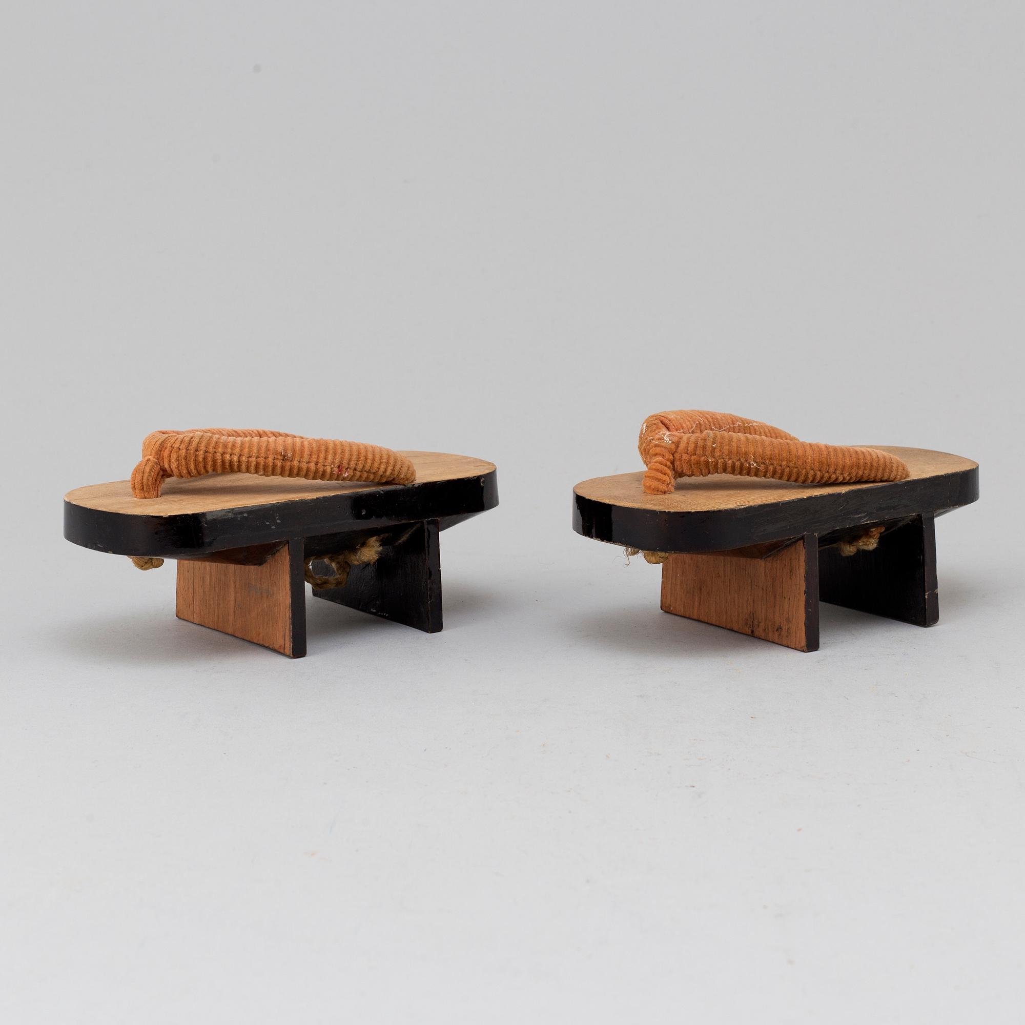 A pair of Japanese 'Geta' shows and two Chinese pouches, early 20th century.