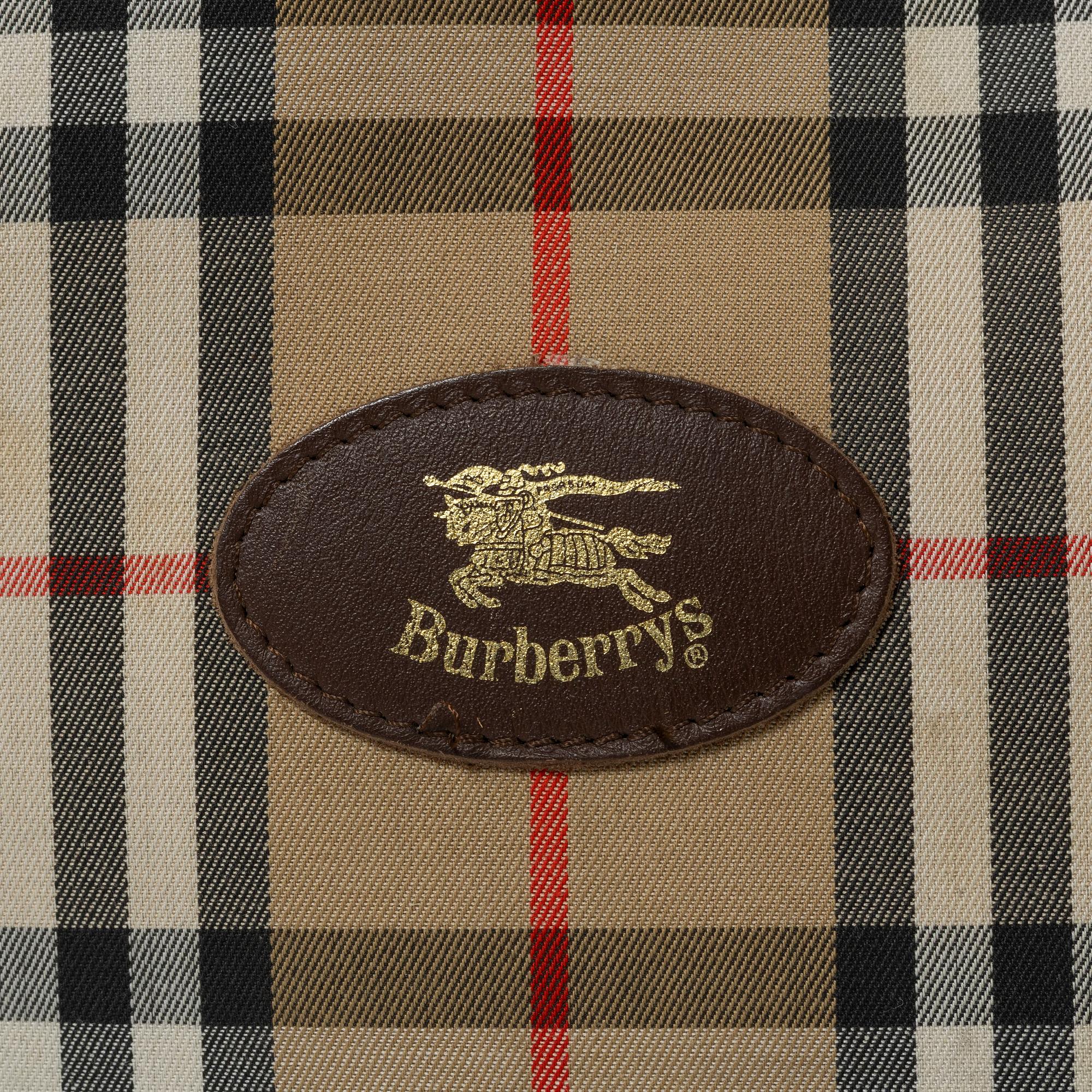 Burberry, a tennis bag.