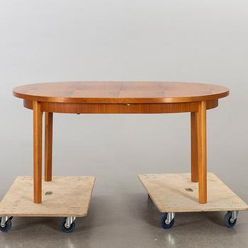 A second half of the 20th century walnut dining table.