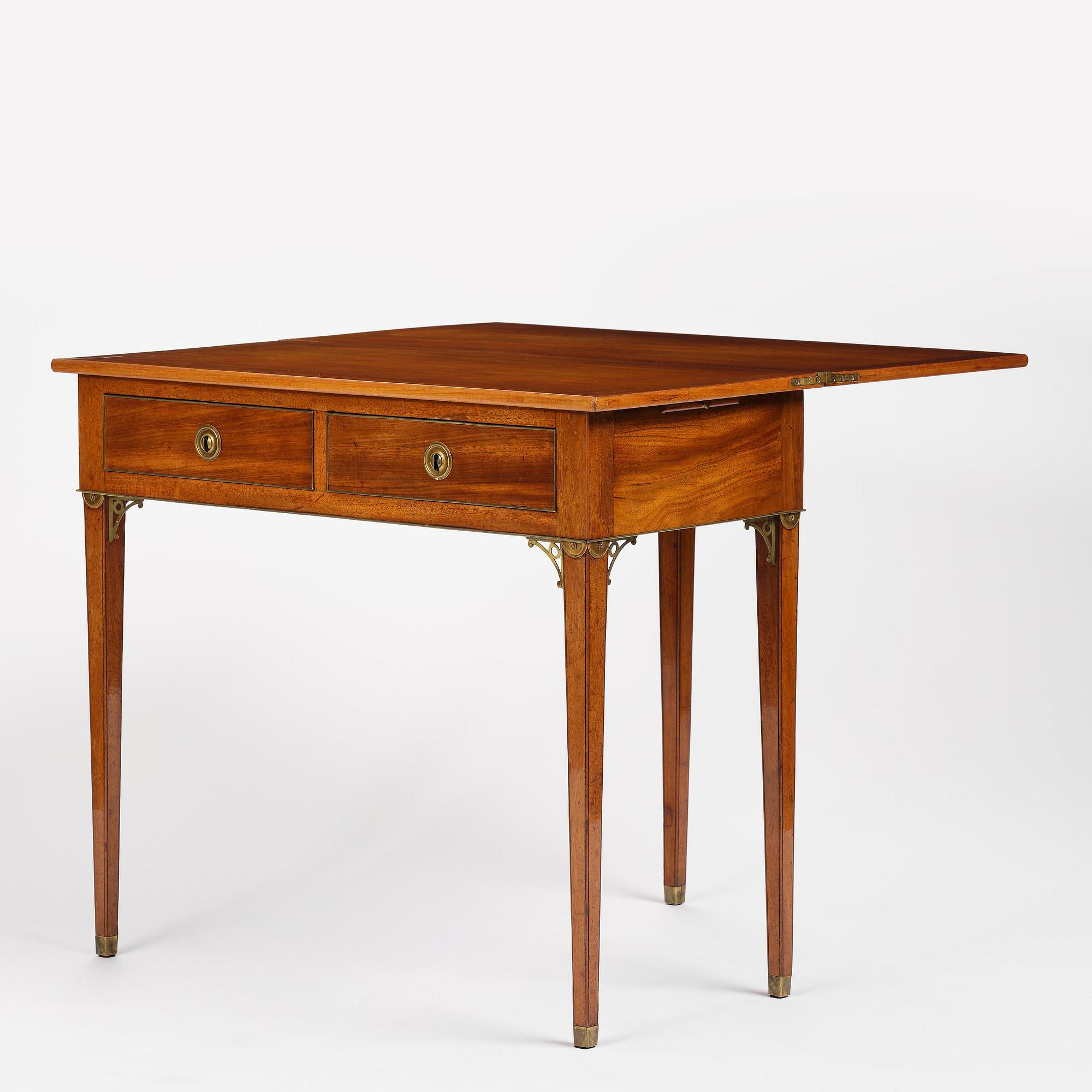 A late Gustavian mahogany games table, presumably by A. Nordström (Journeyman at G. Iwersson 1806-09).