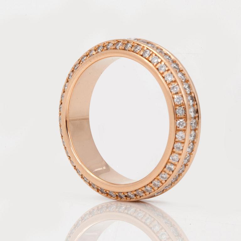 A brilliant-cut diamond eternity ring.