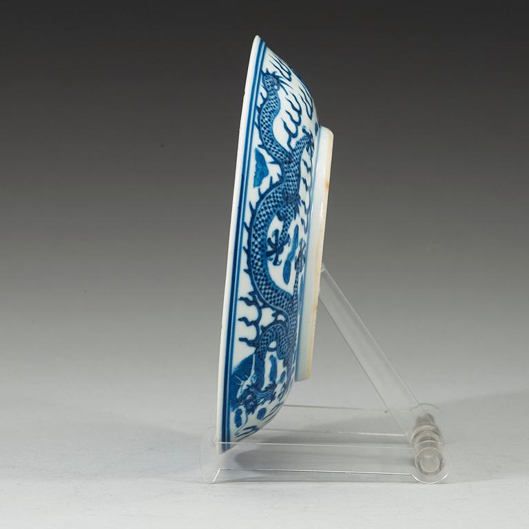 A blue and white dragon-dish, Qing dynasty, Guangxu six-character mark and of the period.